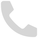 A solid icon of a telephone